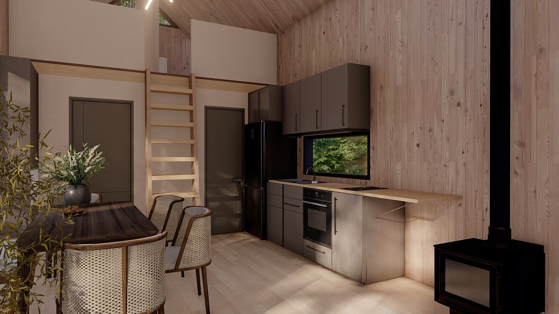 Interior del modelo: cocina equipada y estufa a leña