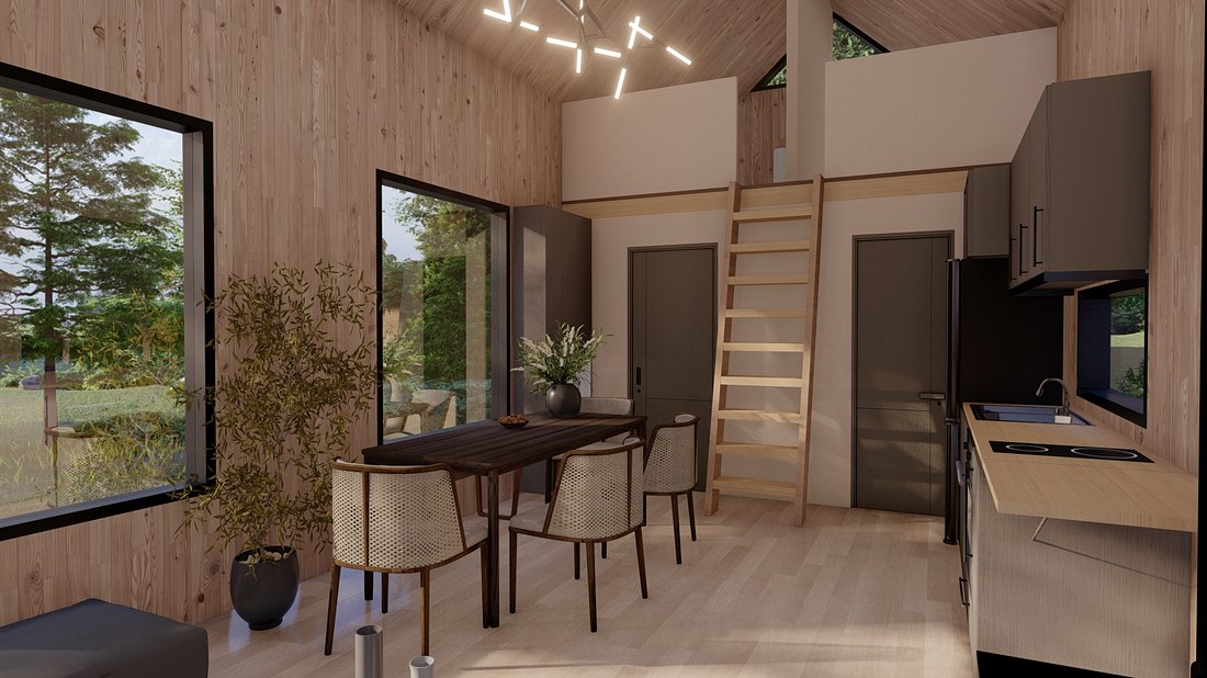 Interior del modelo: comedor, escalera al altillo y cocina